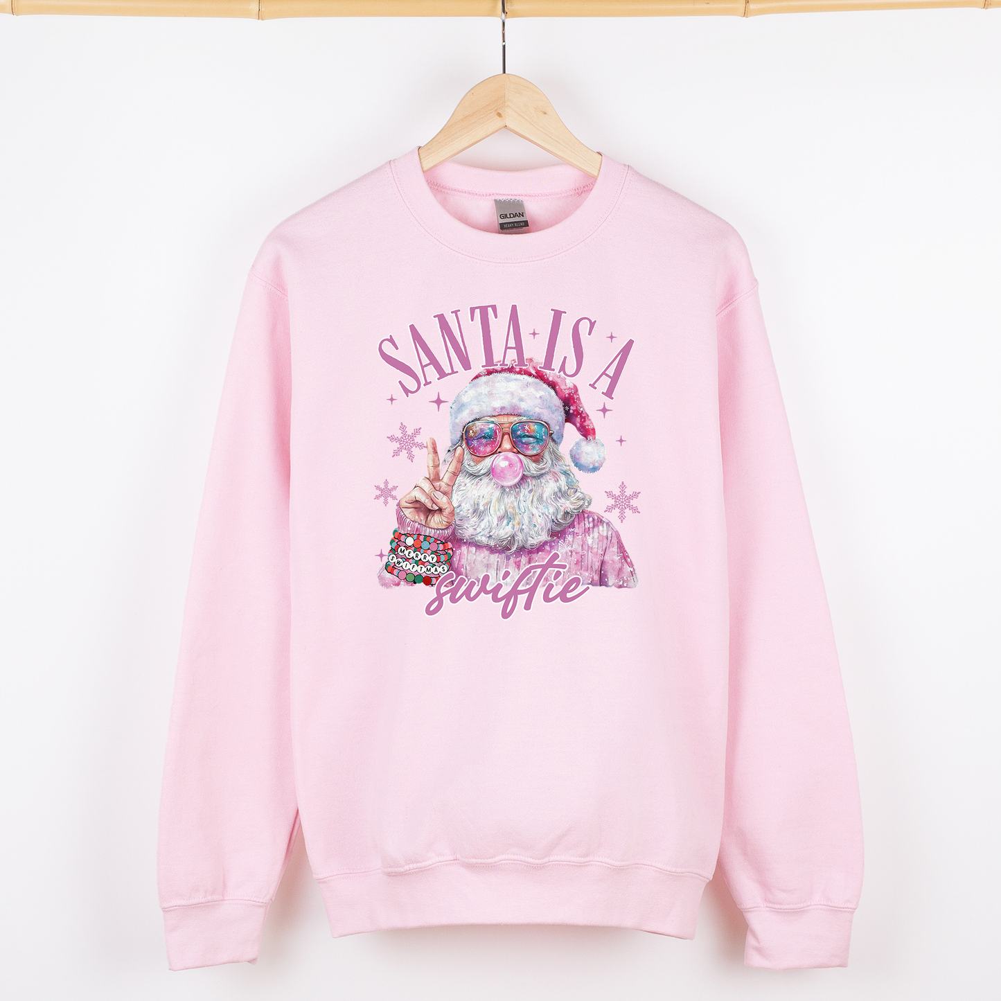 Santa is a Swiftie Baby Pink Sweatshirt