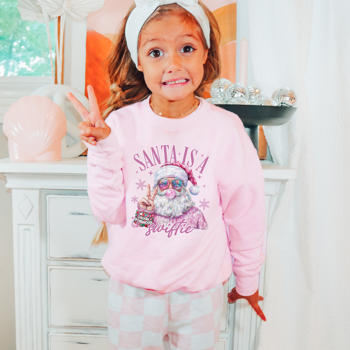 Santa is a Swiftie Baby Pink Sweatshirt